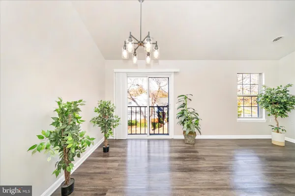 a view of entryway with wooden floor
