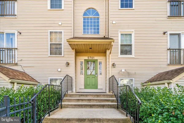 a front view of a house with a porch