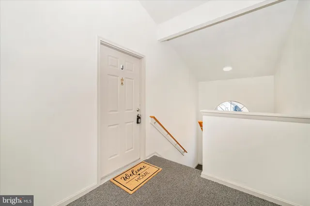 a view of an entryway with stairs