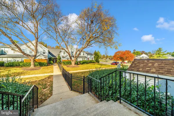 a view of a swimming pool with a lounge chairs