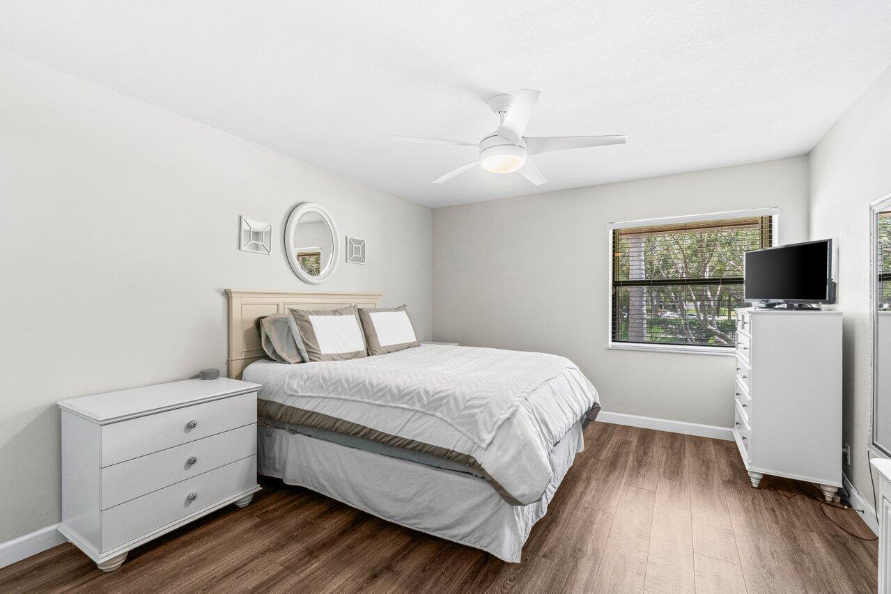 22148 Palms Way, Unit 203 Boca Raton, FL 33433 - Photo 11 of 29 Primary Bedroom