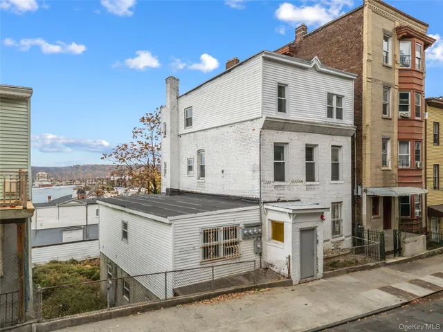a large white building with a white stove