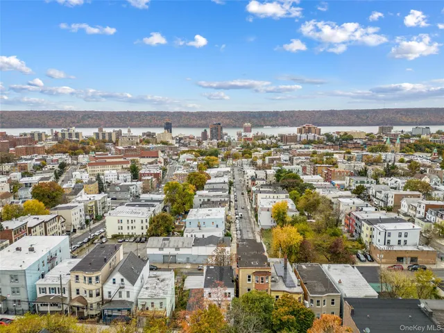 an aerial view of residential building with parking space