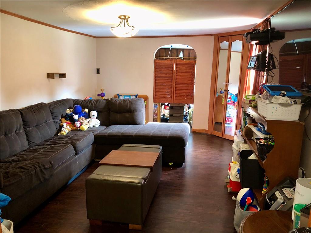 203 Lighthouse Road Commodore, PA 15729 - Photo 6 of 16 a living room with furniture and a flat screen tv