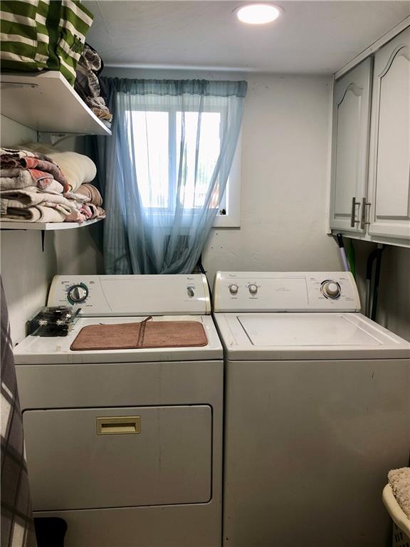 203 Lighthouse Road Commodore, PA 15729 - Photo 9 of 16 a utility room with dryer and washer