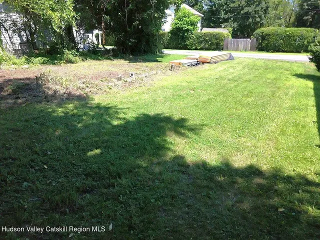 a view of a yard with an outdoor space