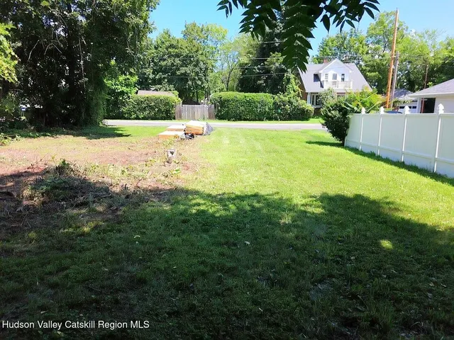 a view of a back yard with green space