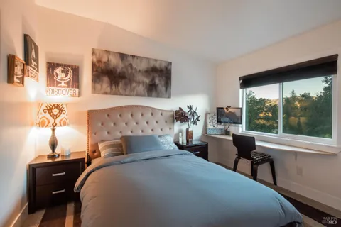 a view of a hallway with washer and dryer