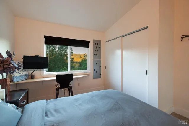 an aerial view of a house with a garden