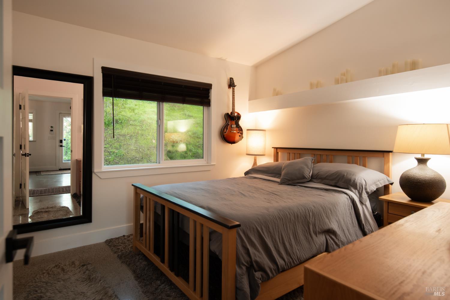 22855 Chianti Road Geyserville, CA 95411 - Photo 16 of 76 a bedroom with two beds and a large window