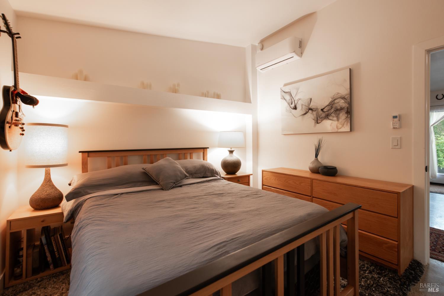 22855 Chianti Road Geyserville, CA 95411 - Photo 17 of 76 a bedroom with a bed and a night stand