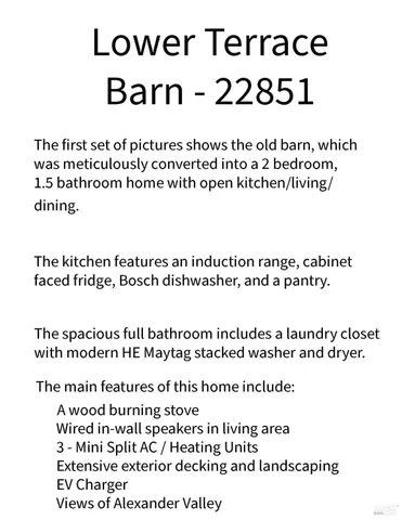 a living room with furniture a rug and a floor to ceiling window