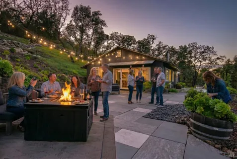 a spacious bedroom with a bed and a flat screen tv
