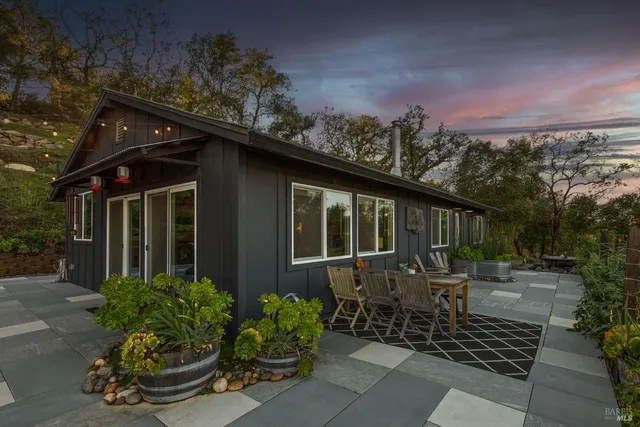 a kitchen with a stove and a refrigerator