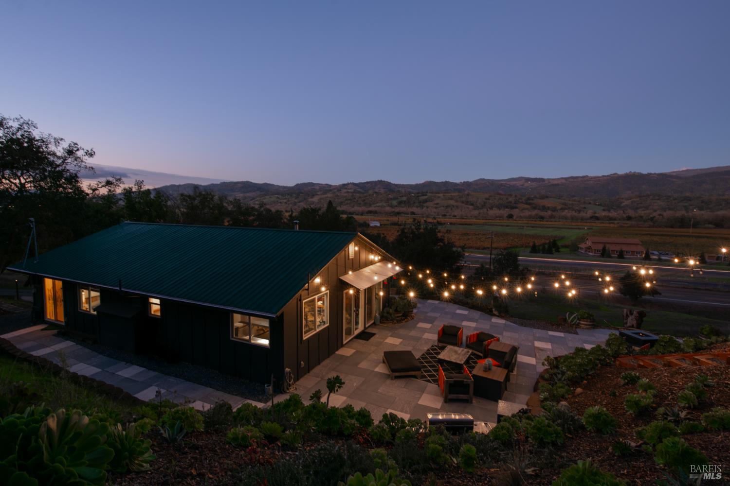 22855 Chianti Road Geyserville, CA 95411 - Photo 3 of 76 a view of a terrace with a garden