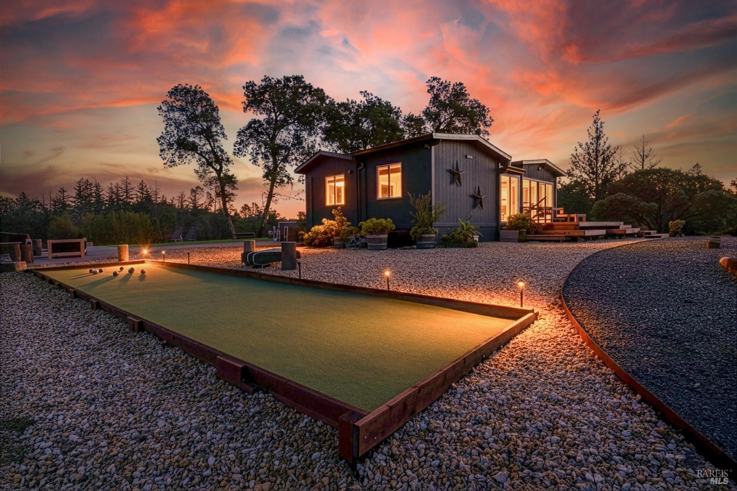22855 Chianti Road Geyserville, CA 95411 - Photo 64 of 76 a view of swimming pool with outdoor seating and trees in the background