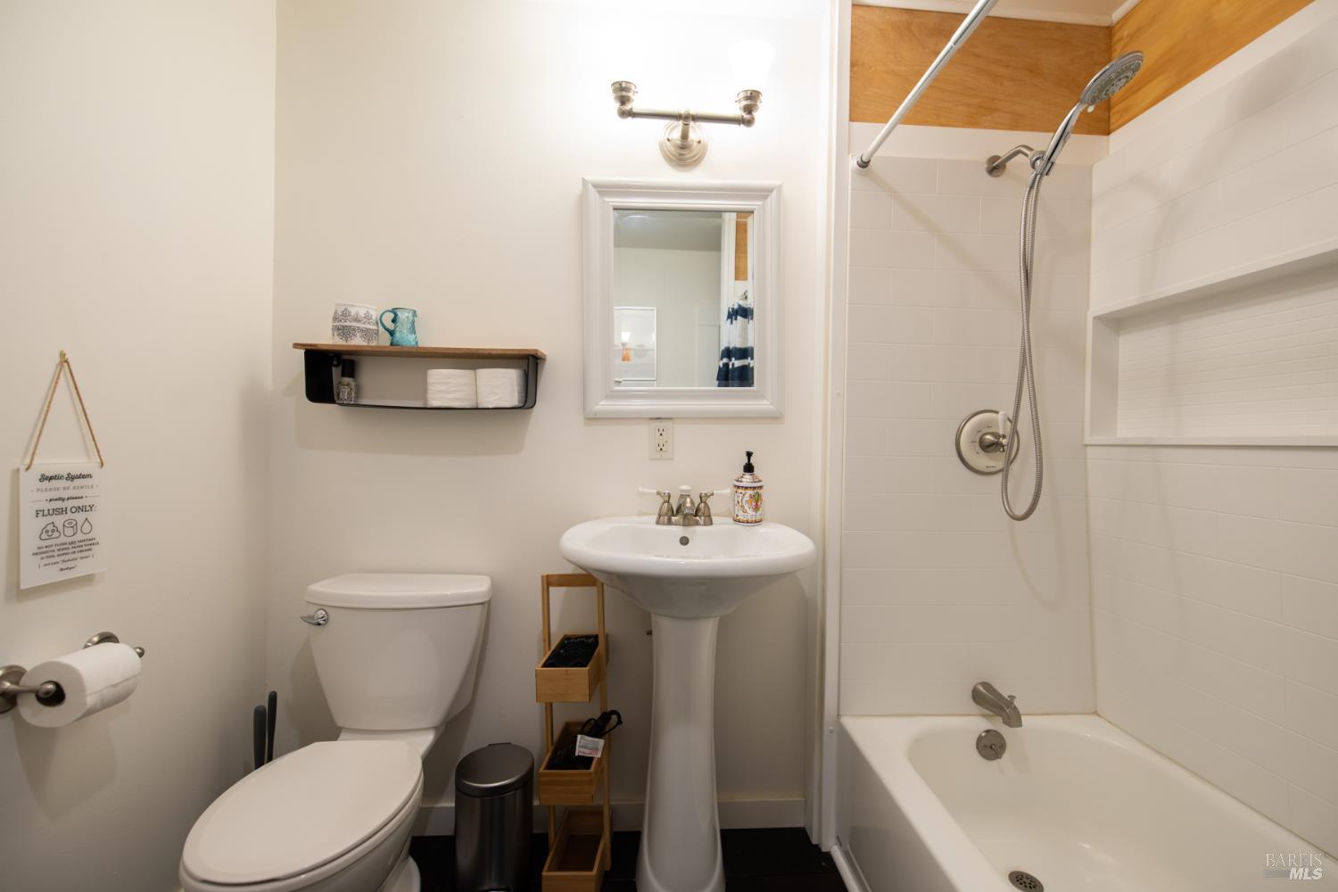 22855 Chianti Road Geyserville, CA 95411 - Photo 75 of 76 a bathroom with a sink toilet and shower