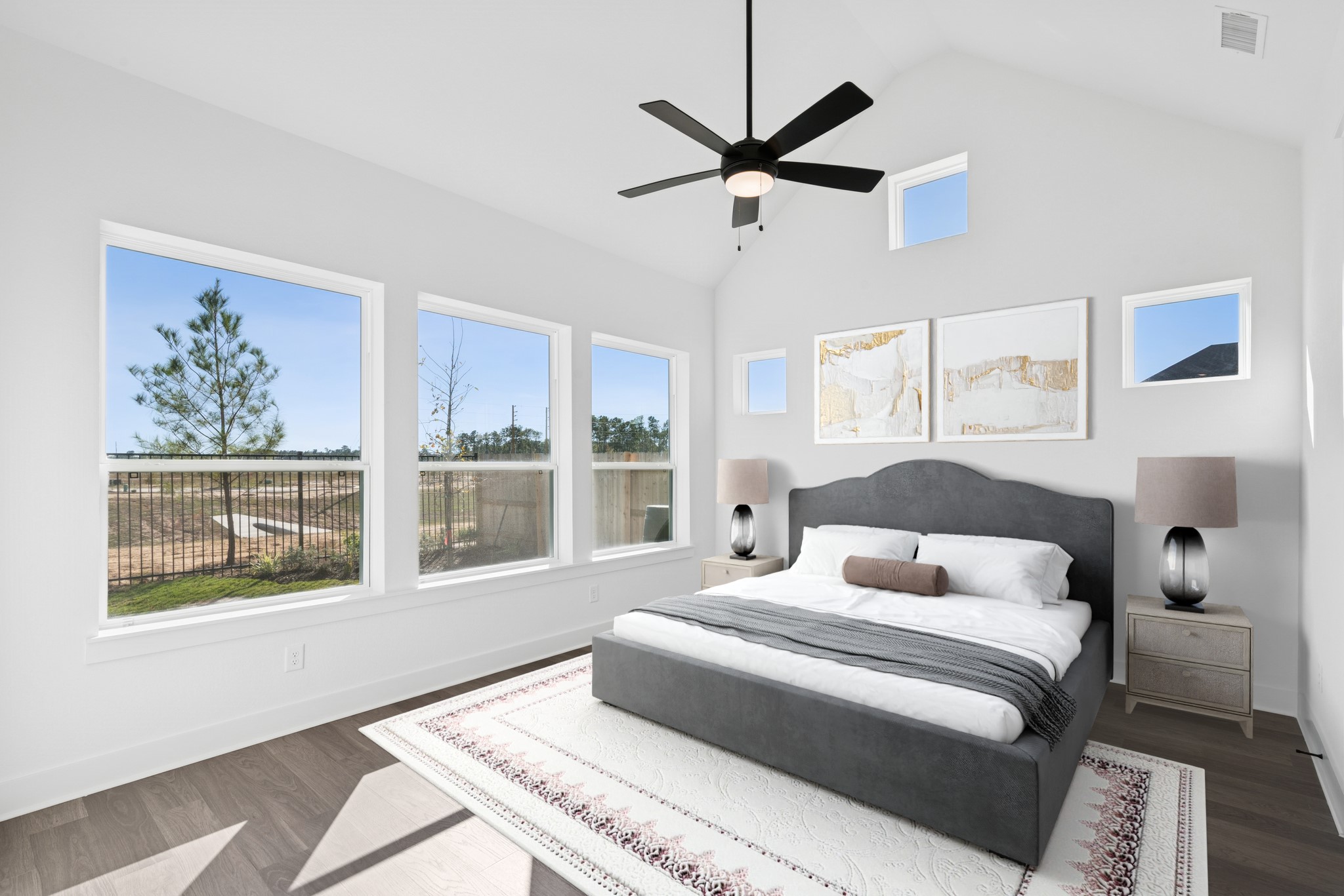 16138 Rita Road Conroe, TX 77302 - Photo 6 of 50 a bedroom with a large bed and a window