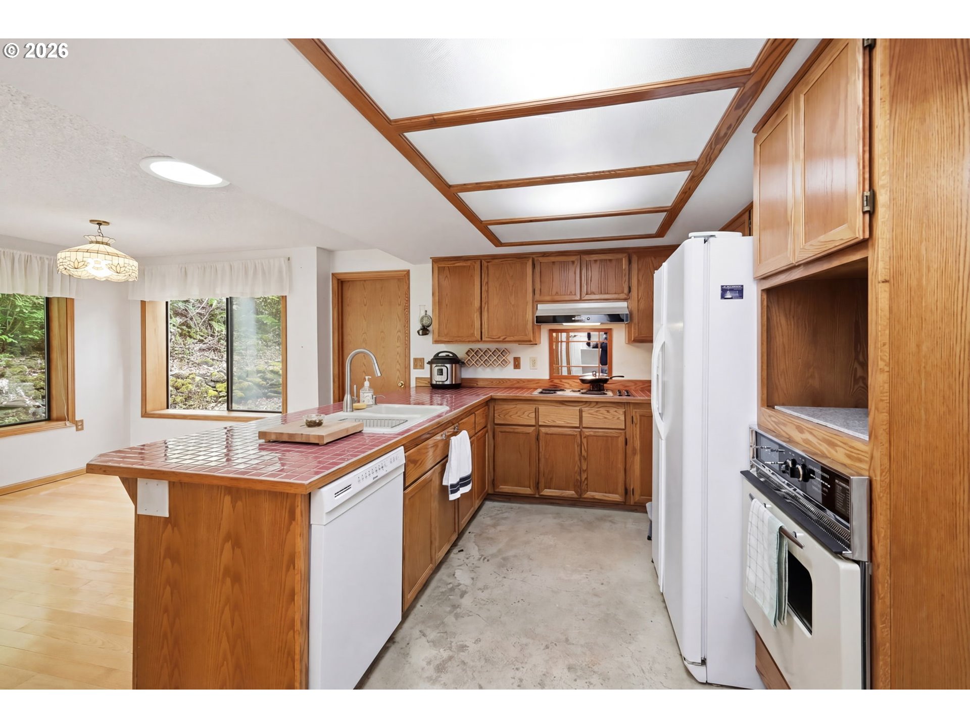 2983 Timberline Drive Eugene, OR 97405 - Photo 10 of 31 a kitchen with refrigerator and cabinets