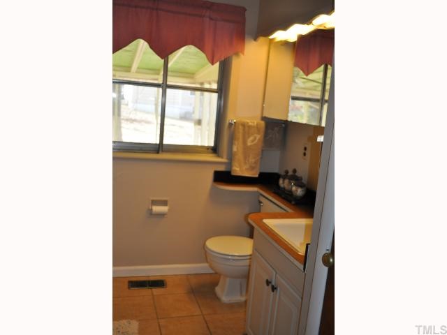 2426 Kennington Road Raleigh, NC 27610 - Photo 4 of 8 Full Bath with Updated Ceramic Tile.