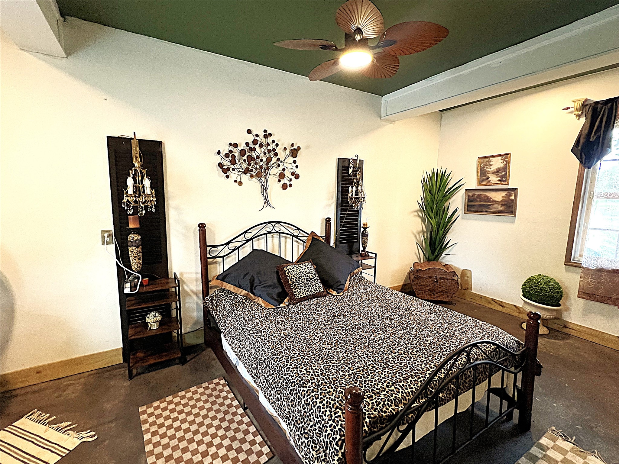 2503 River Crest, Unit 1 Houston, TX 77338 - Photo 16 of 28 a bedroom with a bed and wooden floor