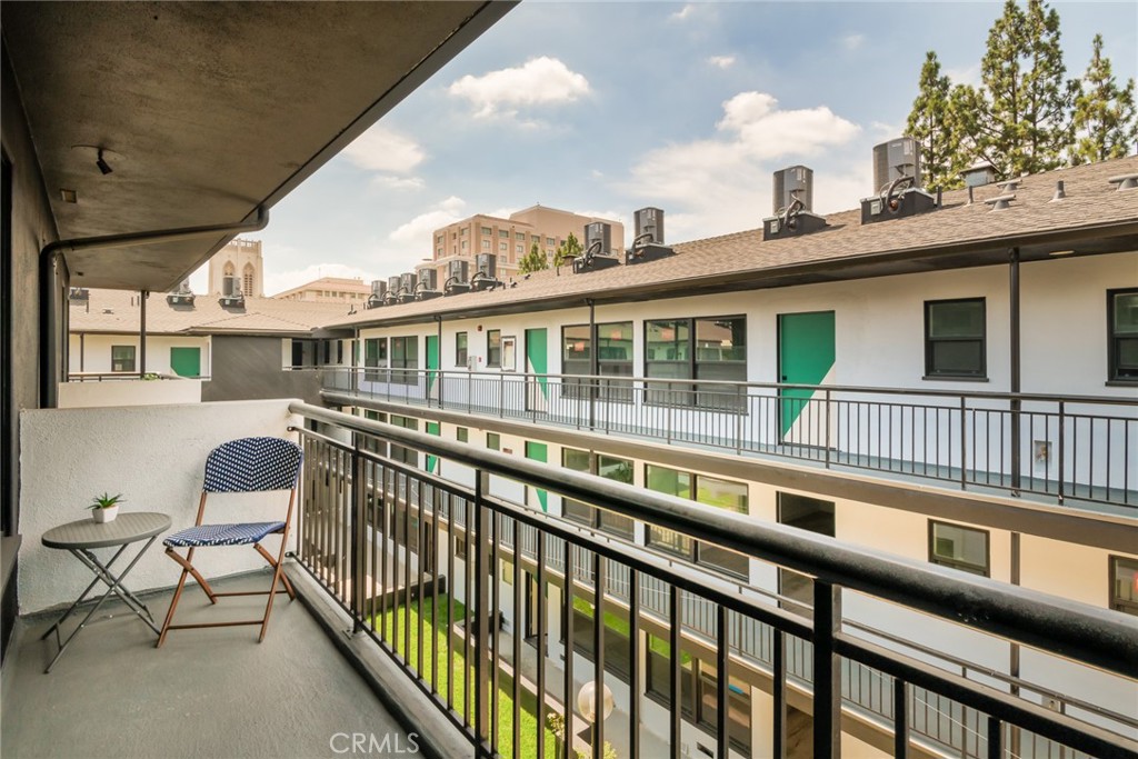 262 North Los Robles Avenue Pasadena, CA 91101 - Photo 11 of 45 a view of a large building from a balcony
