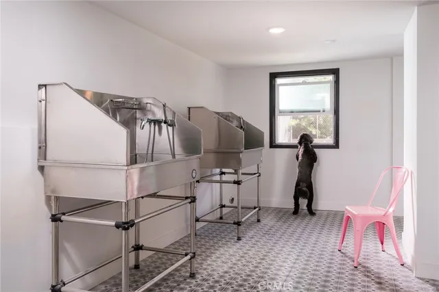 a room with lots of chairs and windows