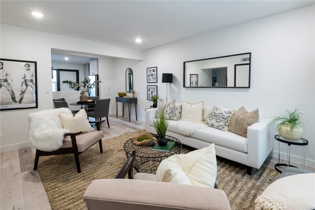 262 North Los Robles Avenue Pasadena, CA 91101 - Photo 24 of 45 a living room with furniture and wooden floor