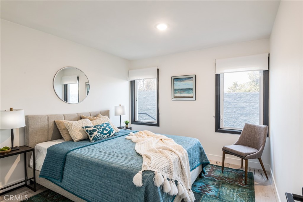 262 North Los Robles Avenue Pasadena, CA 91101 - Photo 31 of 45 a bedroom with a bed and a window