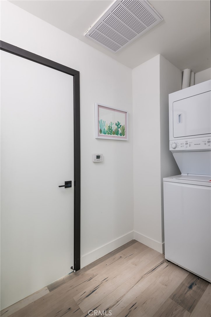 262 North Los Robles Avenue Pasadena, CA 91101 - Photo 34 of 45 a view of storage and utility room with washer and dryer