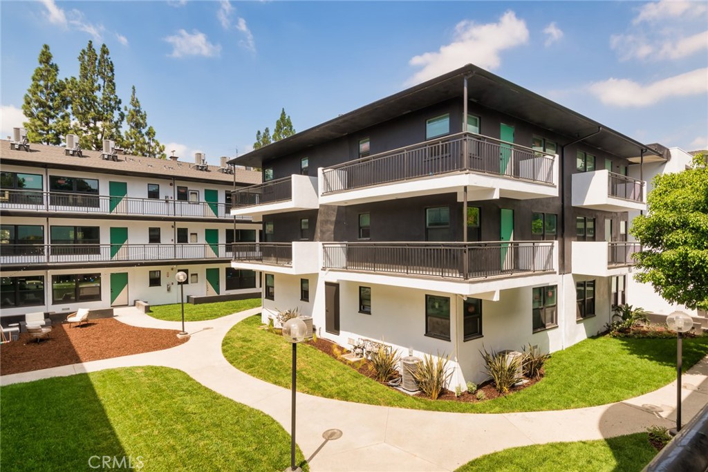 262 North Los Robles Avenue Pasadena, CA 91101 - Photo 6 of 45 a front view of a house with a yard