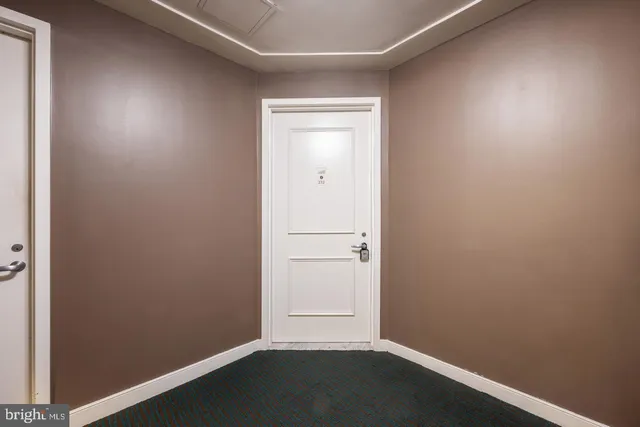 an empty room with a door