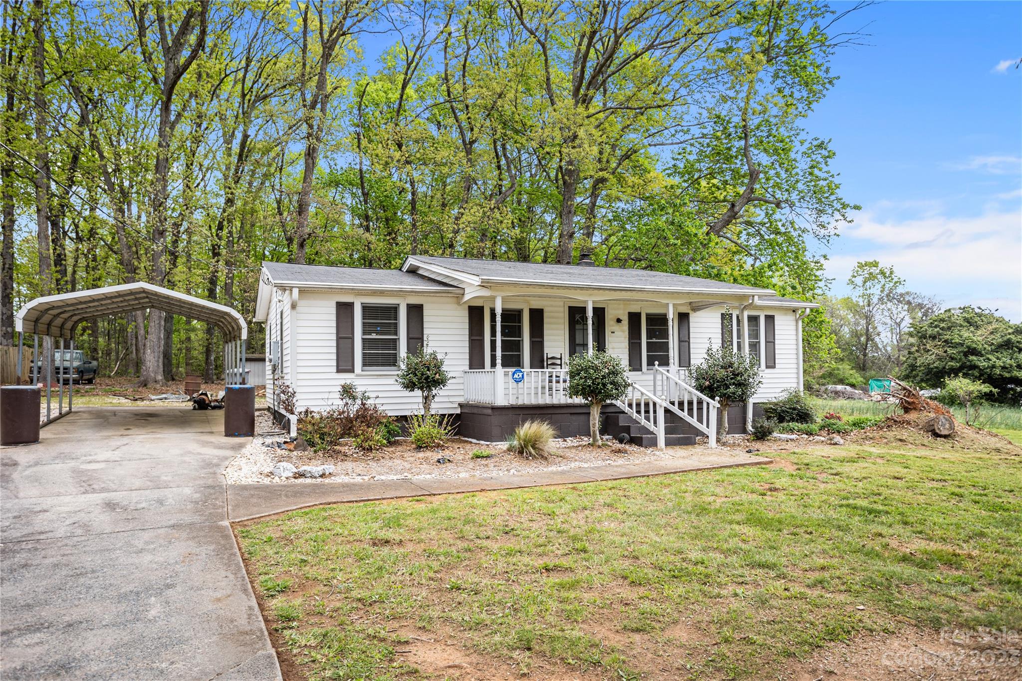 5641 Anderson Road Charlotte, NC 28269 - Photo 2 of 27 a view of a house with a patio