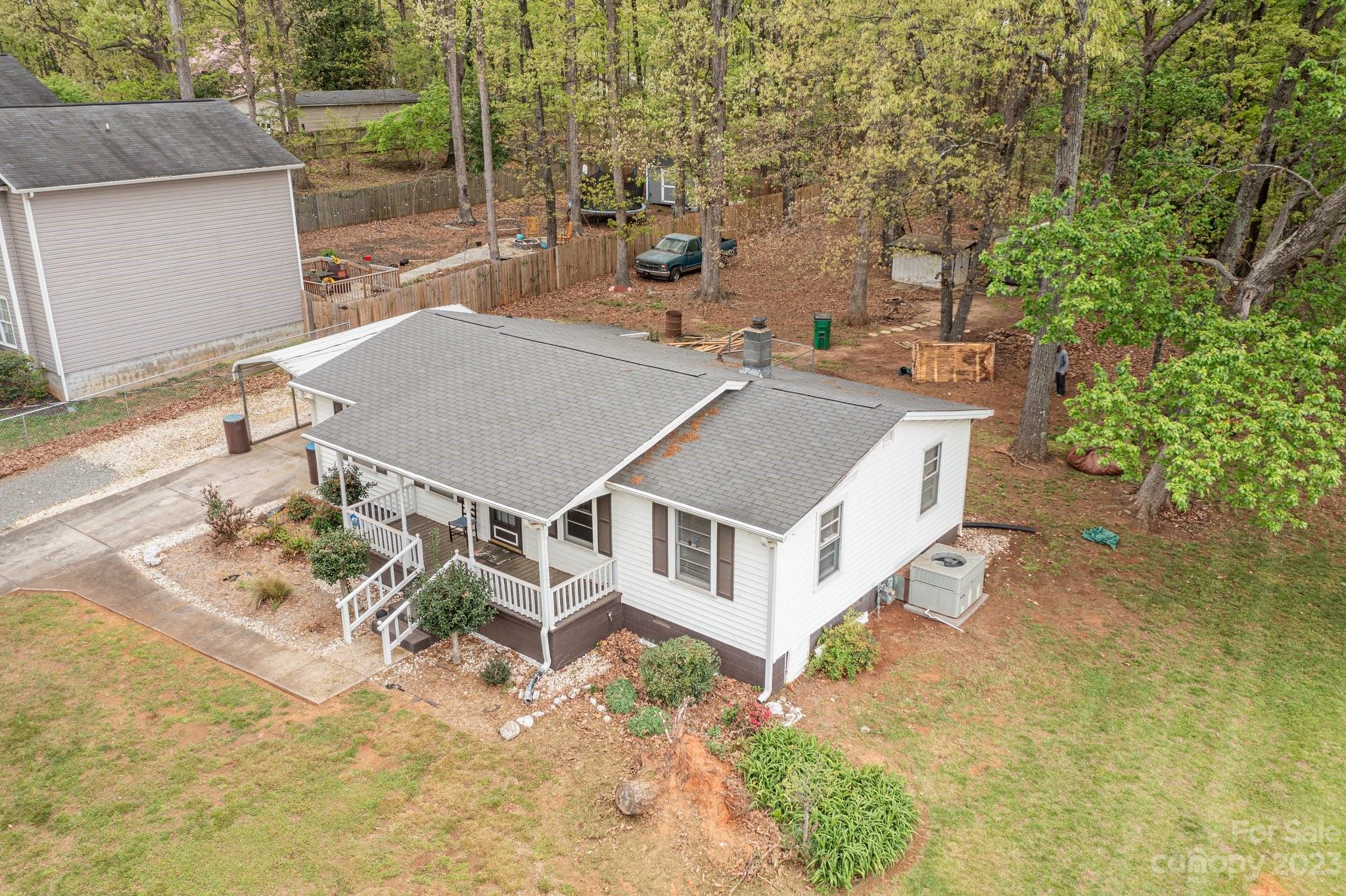 5641 Anderson Road Charlotte, NC 28269 - Photo 23 of 27 a view of a house with large windows