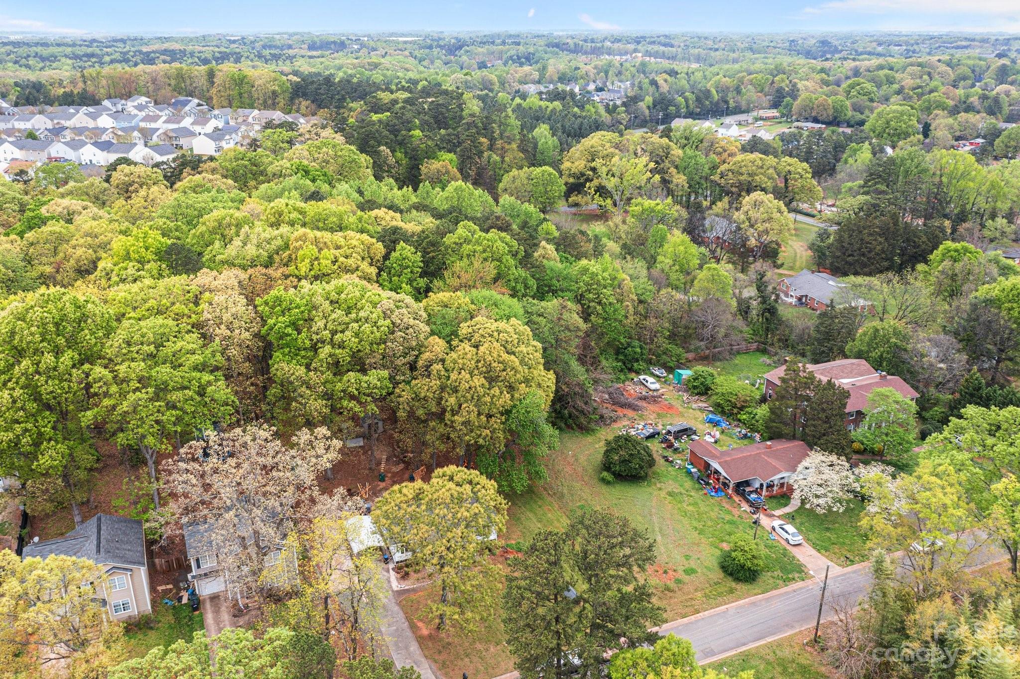 5641 Anderson Road Charlotte, NC 28269 - Photo 25 of 27 an aerial view of a residential houses with outdoor space