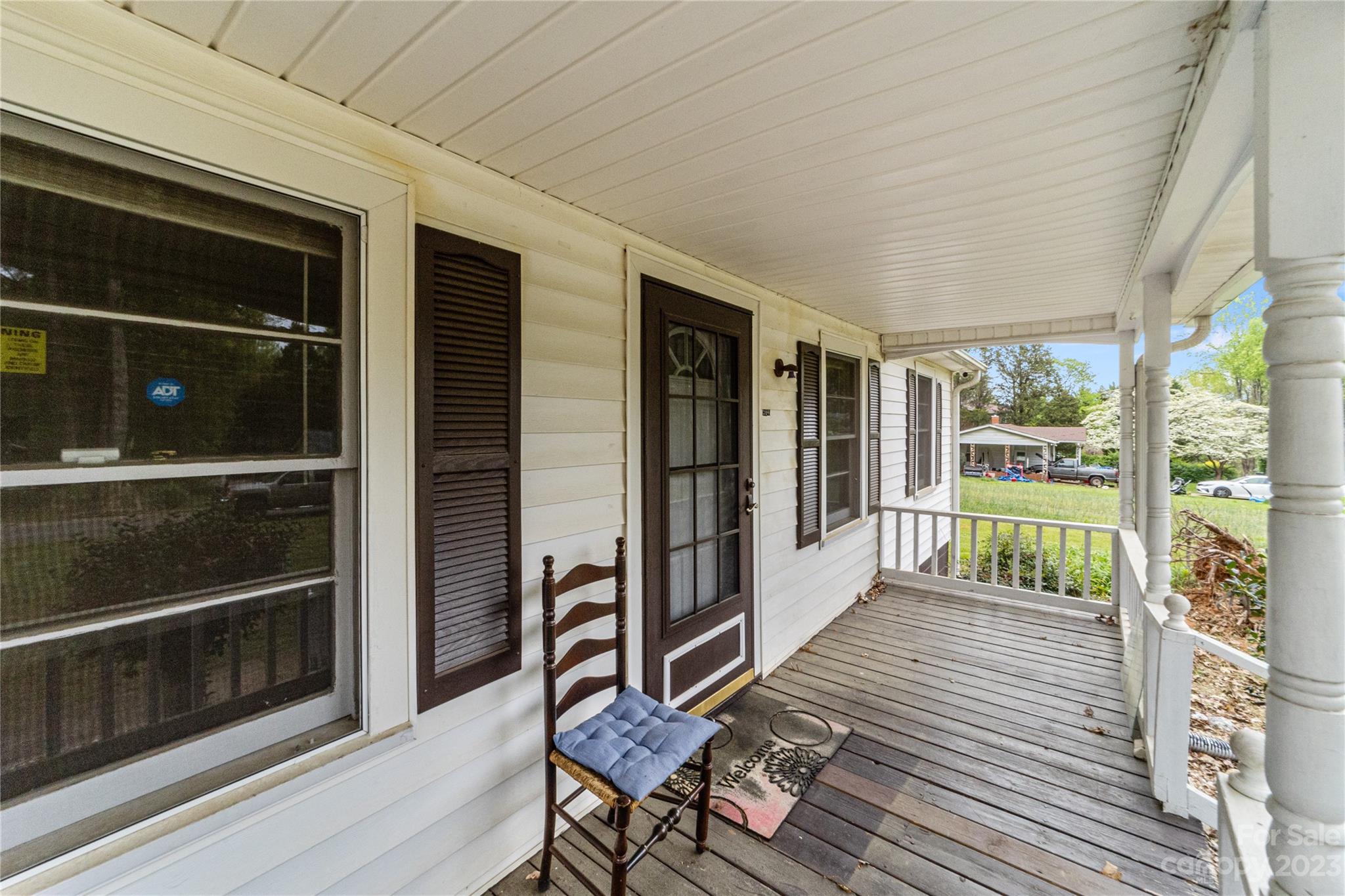 5641 Anderson Road Charlotte, NC 28269 - Photo 4 of 27 a view of a porch with wooden floor and outdoor space