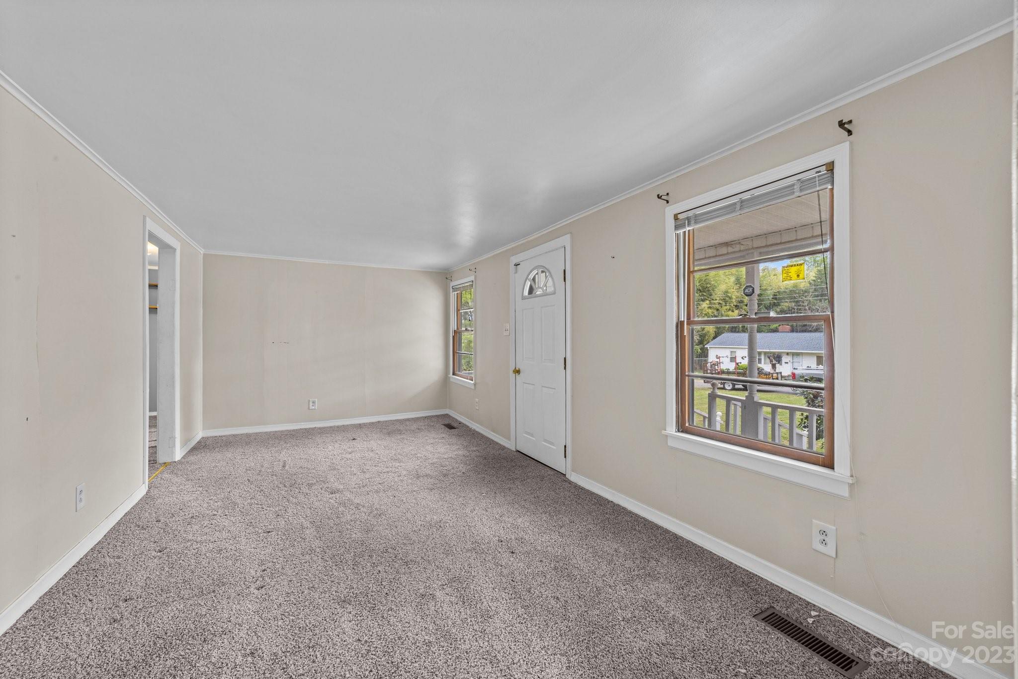 5641 Anderson Road Charlotte, NC 28269 - Photo 7 of 27 a view of an empty room with a window