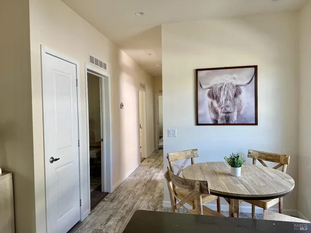 a view of a dining room with furniture