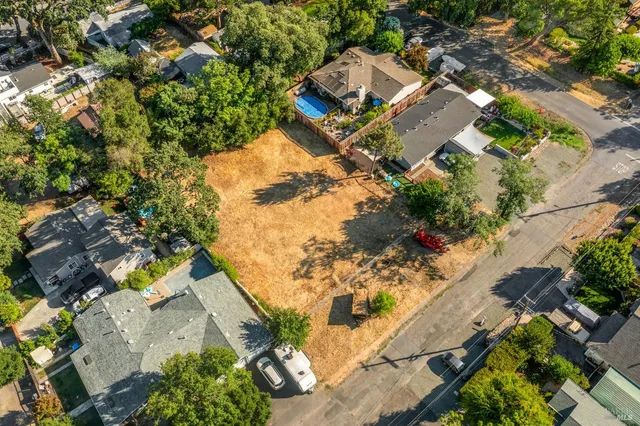 an aerial view of residential house with outdoor space