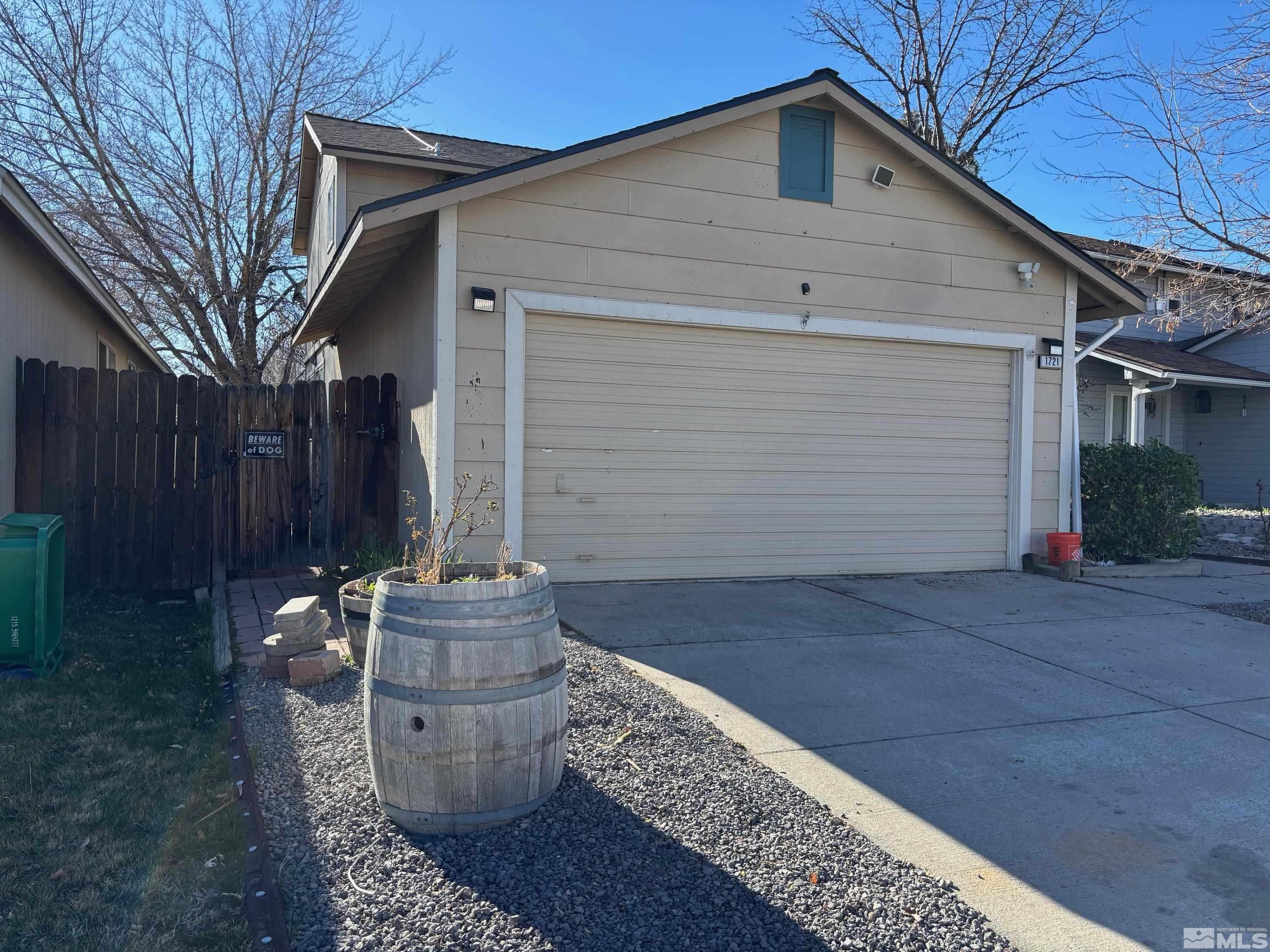 1721 Burnside Drive Sparks, NV 89434 - Photo 1 of 20 a front view of house with garage