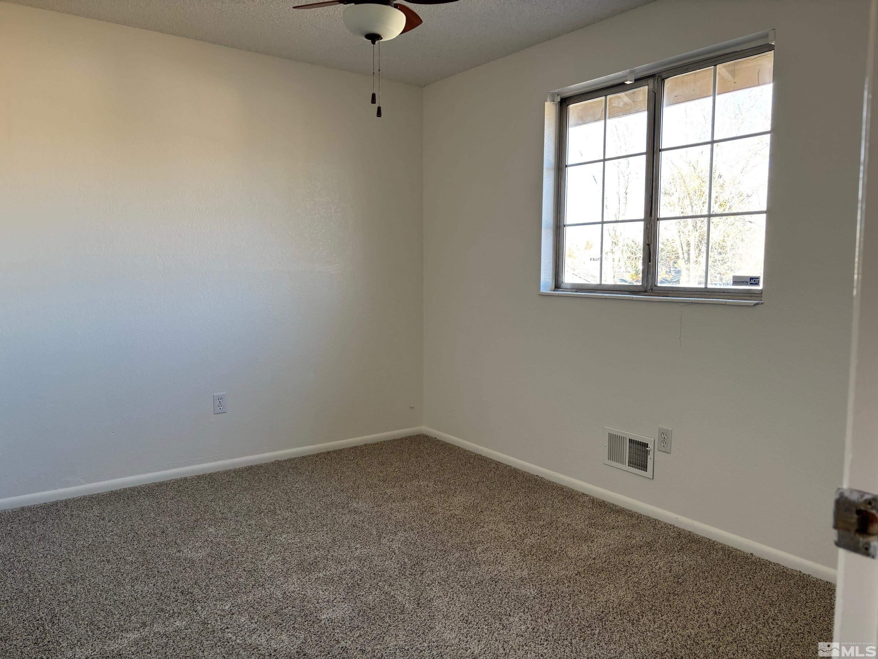 1721 Burnside Drive Sparks, NV 89434 - Photo 16 of 20 an empty room with a window