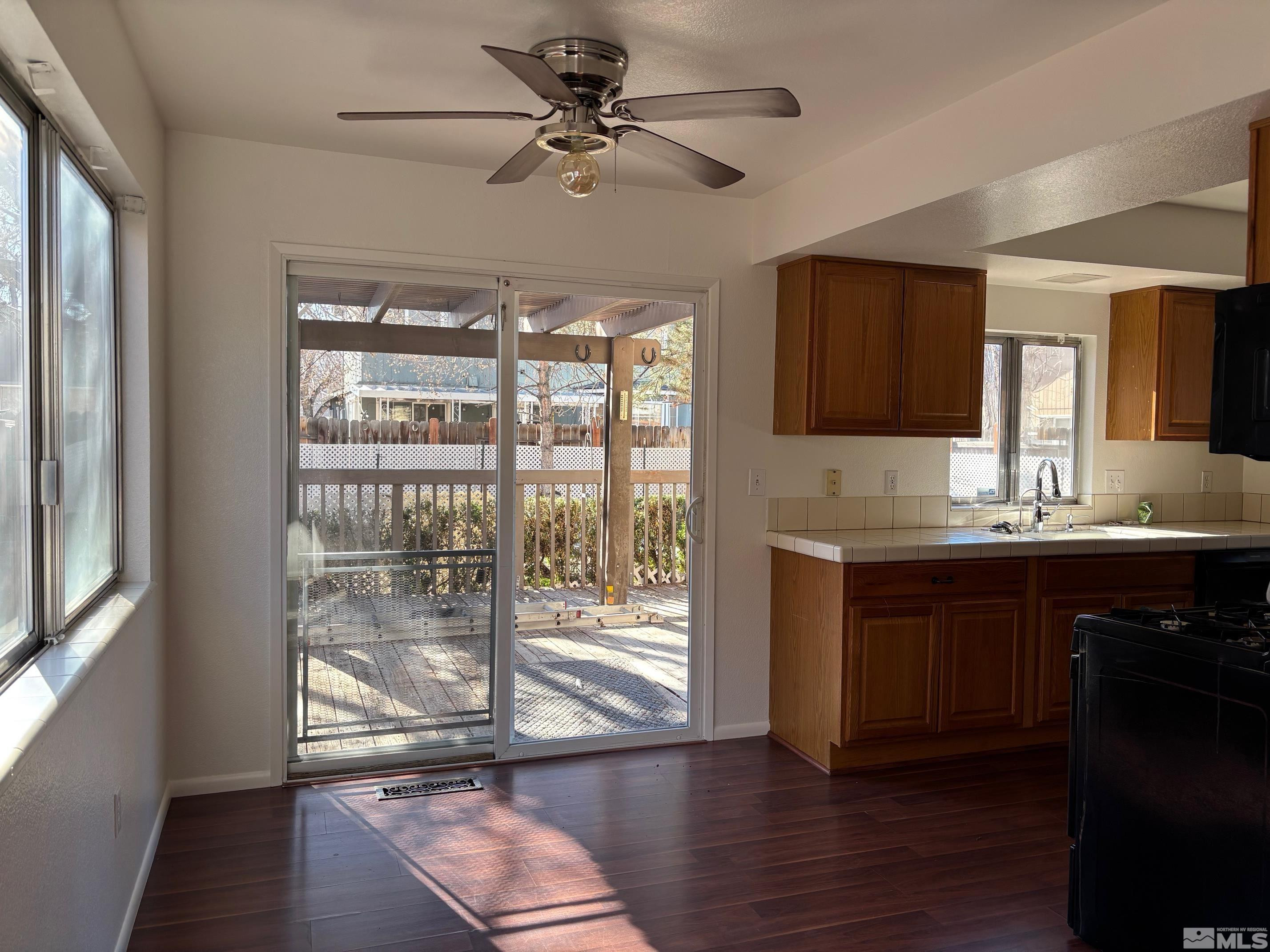 1721 Burnside Drive Sparks, NV 89434 - Photo 20 of 20 a kitchen with granite countertop a stove and a sink