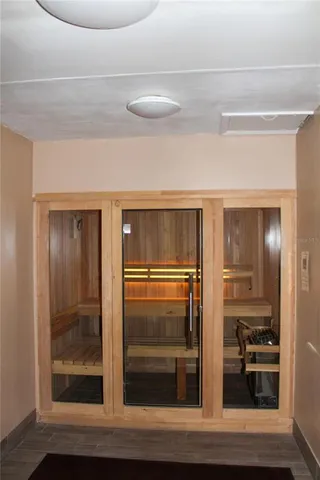 a room with closet and wooden floor