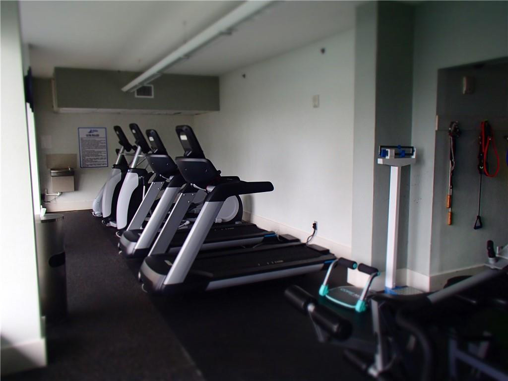 200 Southeast 15th Road, Unit 11H Miami, FL 33129 - Photo 13 of 35 a view of a room with gym equipment