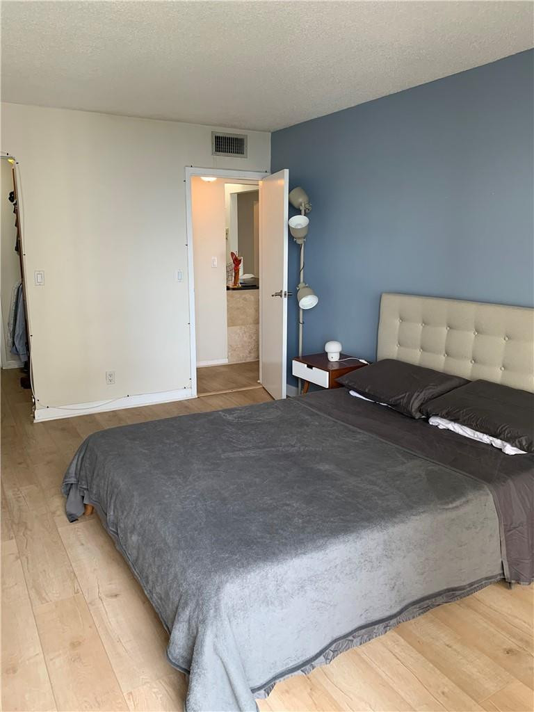 200 Southeast 15th Road, Unit 11H Miami, FL 33129 - Photo 28 of 35 a view of a room with gym equipment