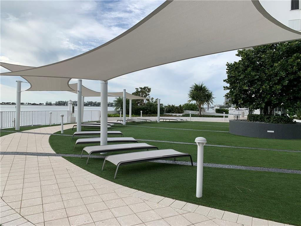 200 Southeast 15th Road, Unit 11H Miami, FL 33129 - Photo 6 of 35 a view of a patio with a yard