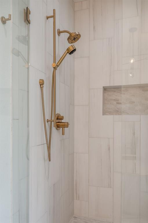 3930 Bowser Avenue, Unit 11 Dallas, TX 75219 - Photo 28 of 39 a bathroom with a shower