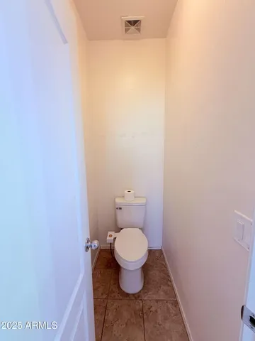 a bathroom with a shower a sink and a mirror