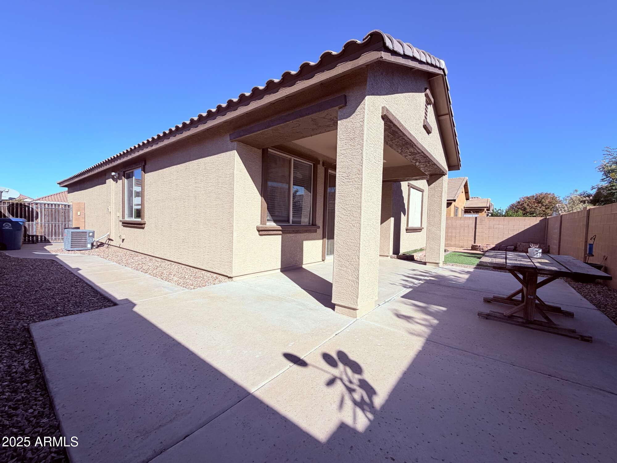 21121 East Via De Olivos Queen Creek, AZ 85142 - Photo 30 of 34 a view of a house with backyard and sitting area