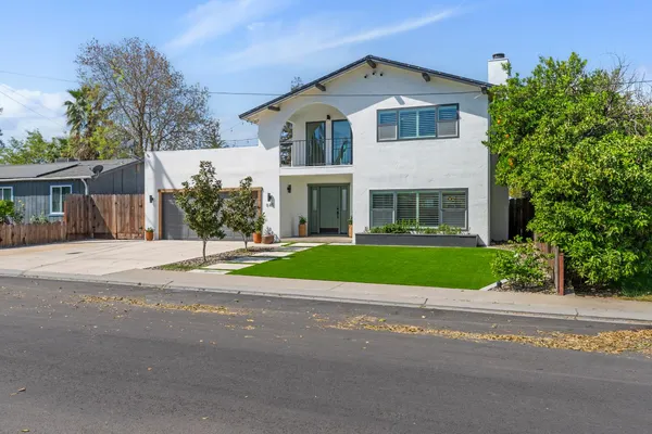 front view of a house with a yard